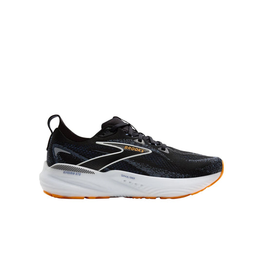 Black running shoe with white midsole, orange outsole accents, and visible side branding