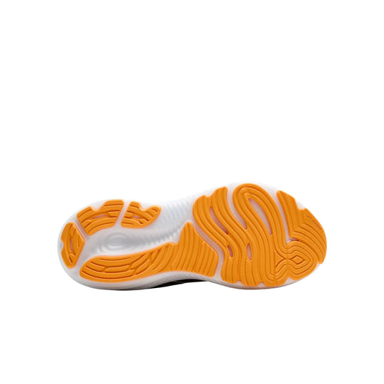 Running shoe outsole with orange tread pods on a white sole.