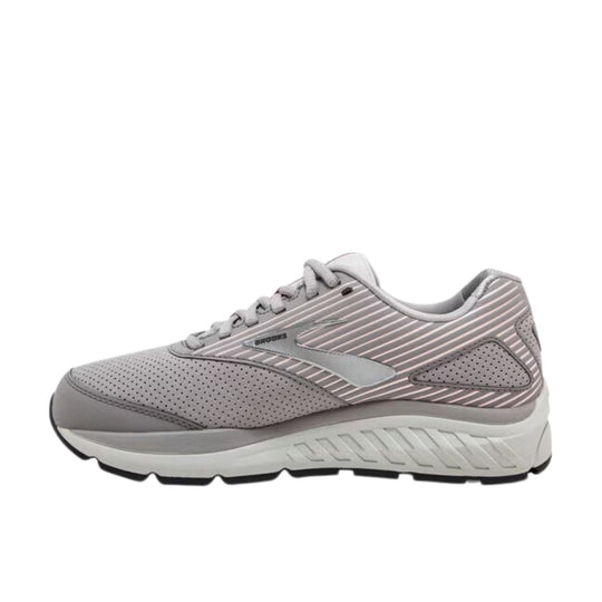 Light gray Brooks walking shoe with mesh and striped side panels, shown in side profile.