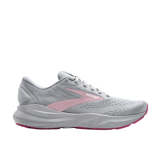 Light gray running shoe with pink side logo, pink outsole accents, and visible Brooks and Adrenaline GTS markings