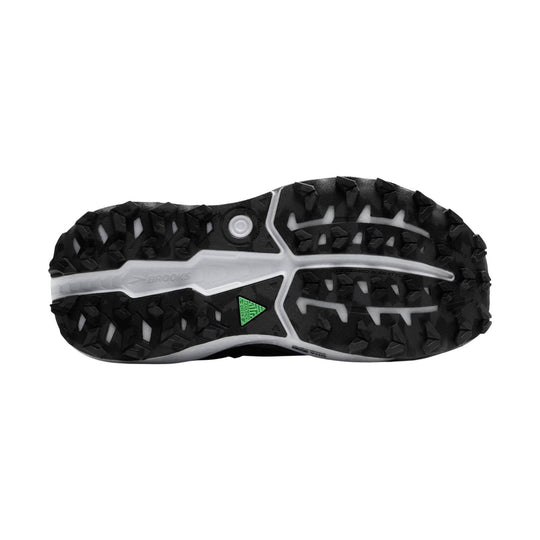 Black trail running shoe outsole with large lug pattern and Brooks branding