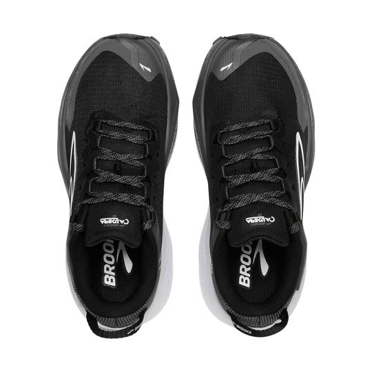 Pair of black trail running shoes with gray overlays and black laces, shown from above