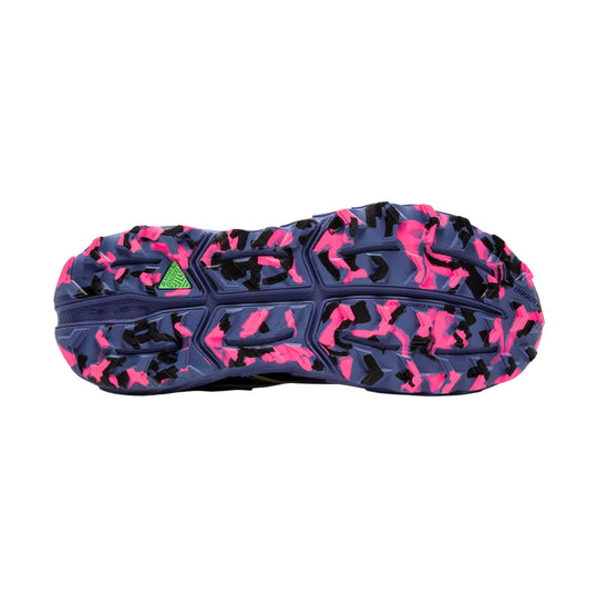 Trail running shoe outsole in navy, pink, and black with deep lugs