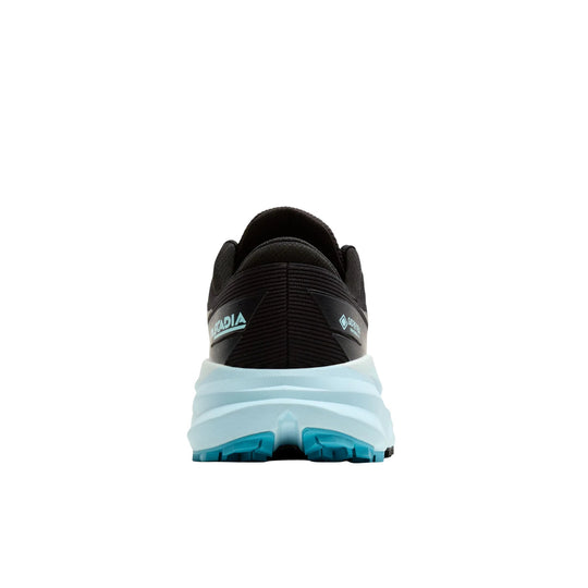 Rear view of a black trail running shoe with a white midsole and blue outsole
