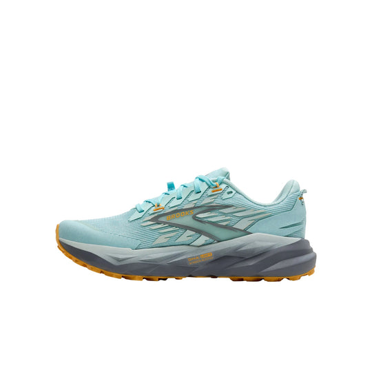 Light blue trail running shoe with gray midsole and orange outsole, shown in side view