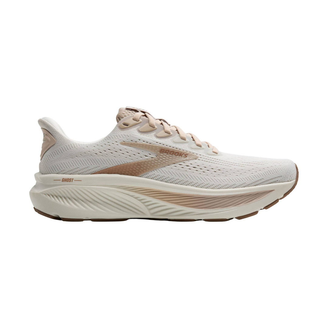 Light beige Brooks running shoe in side view with mesh upper, lace-up closure, and cushioned sole
