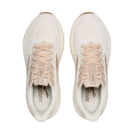 Pair of light beige Brooks running shoes with mesh uppers, tan laces, and visible Ghost 17 branding