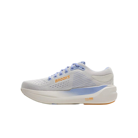 Light gray running shoe with lavender laces, orange logo text, and a thick white cushioned sole, side view