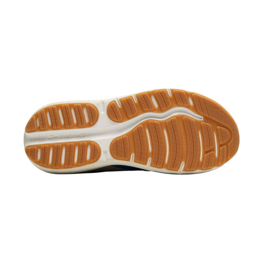 White and orange shoe outsole with Brooks logo and traction tread