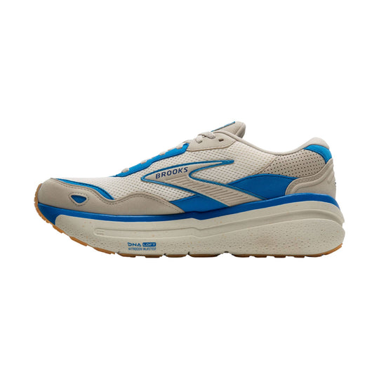 Cream and blue Brooks walking shoe in side view with mesh upper and thick cushioned sole