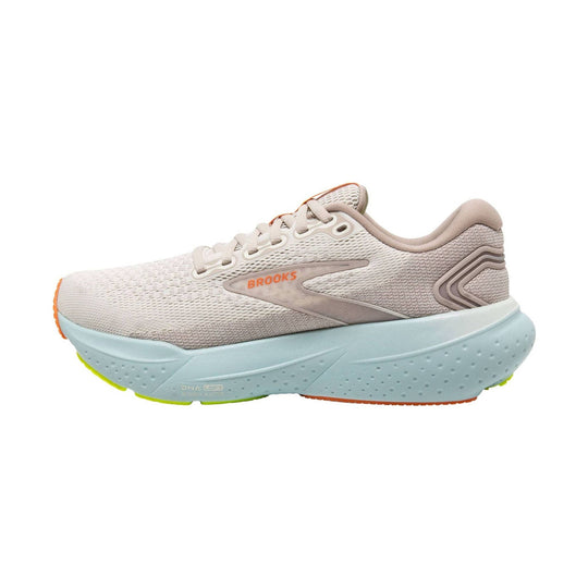 Light beige running shoe with a thick pale blue foam sole and orange accents