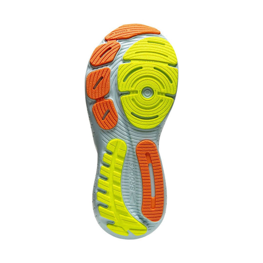 Running shoe outsole with gray base, neon yellow traction pods, and orange forefoot and heel pods