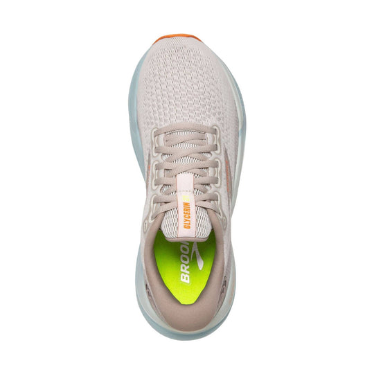 Light beige road running shoe with mesh upper, laced closure, and lime green insole