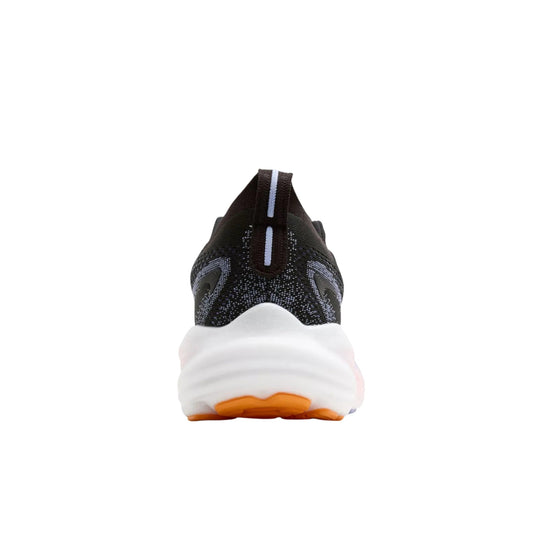 Black knit running shoe with a thick white foam sole and orange outsole, shown from the back