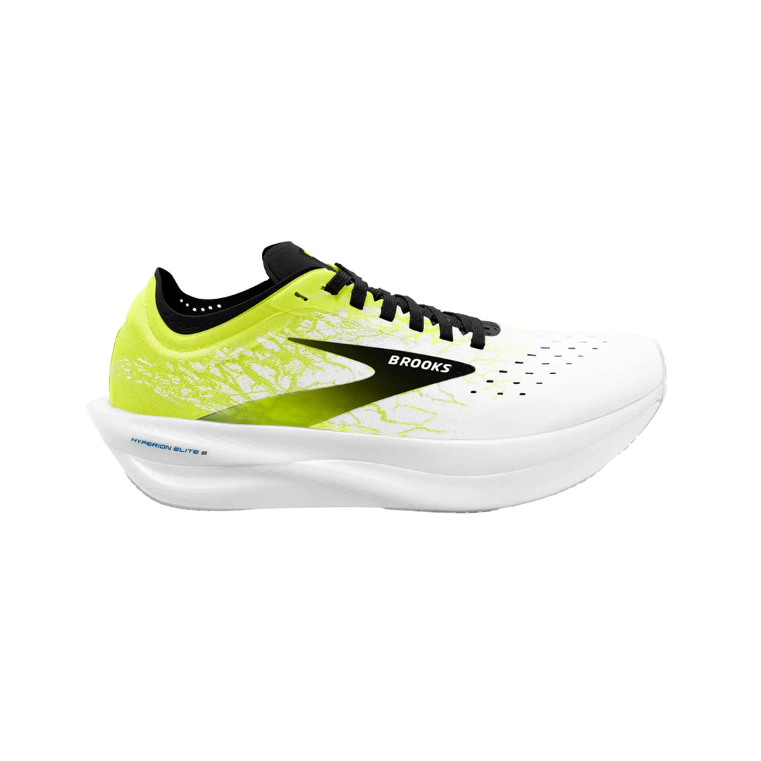 White running shoe with neon yellow heel, black laces, and a thick white midsole