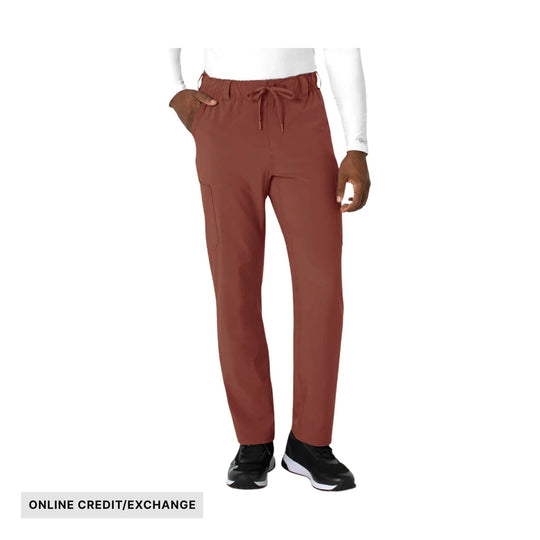 Rust-colored straight-leg scrub pants with drawstring waist and side pockets, shown on a model
