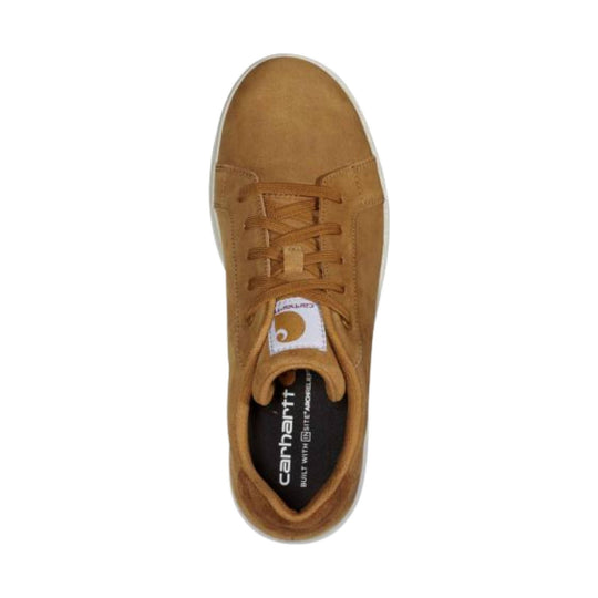Tan low-top lace-up sneaker viewed from above with Carhartt logo on the tongue and insole