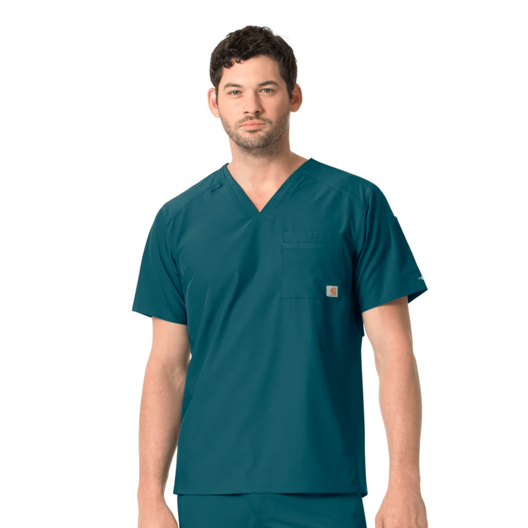 Teal short-sleeve V-neck scrub top with a chest pocket on a male model