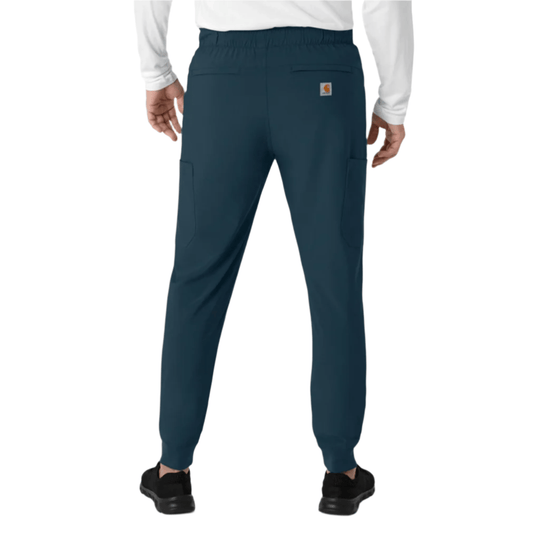 Dark blue jogger-style scrub pants with elastic waistband, cargo pockets, and tapered cuffs