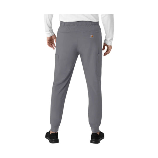 Gray jogger scrub pants shown from the back with elastic waistband, tapered legs, and cargo pockets