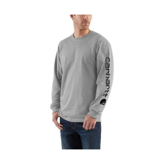 Person wearing a gray long-sleeve shirt with a brand logo on a white background