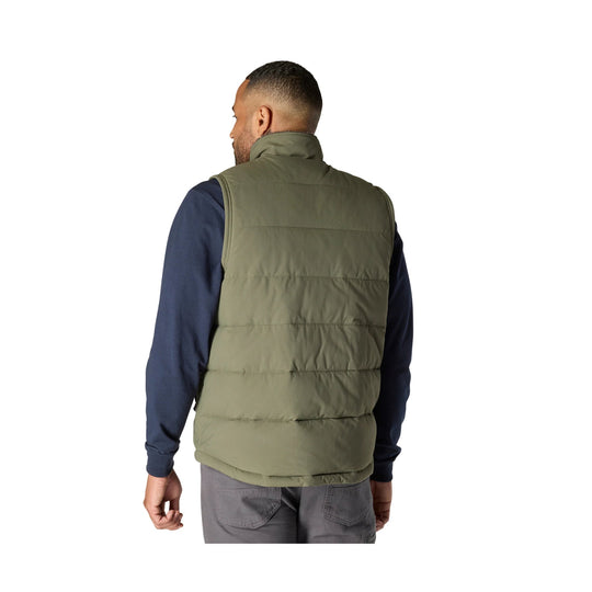 Olive insulated vest worn over a navy long-sleeve shirt, shown from the back