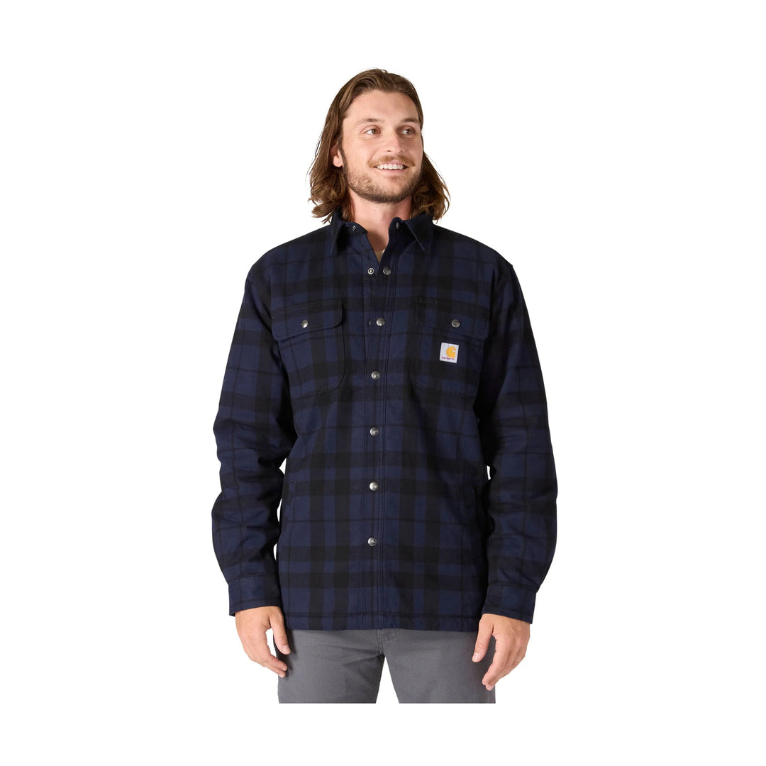 Navy and black plaid button-up shirt jacket with chest pockets and a Carhartt logo patch