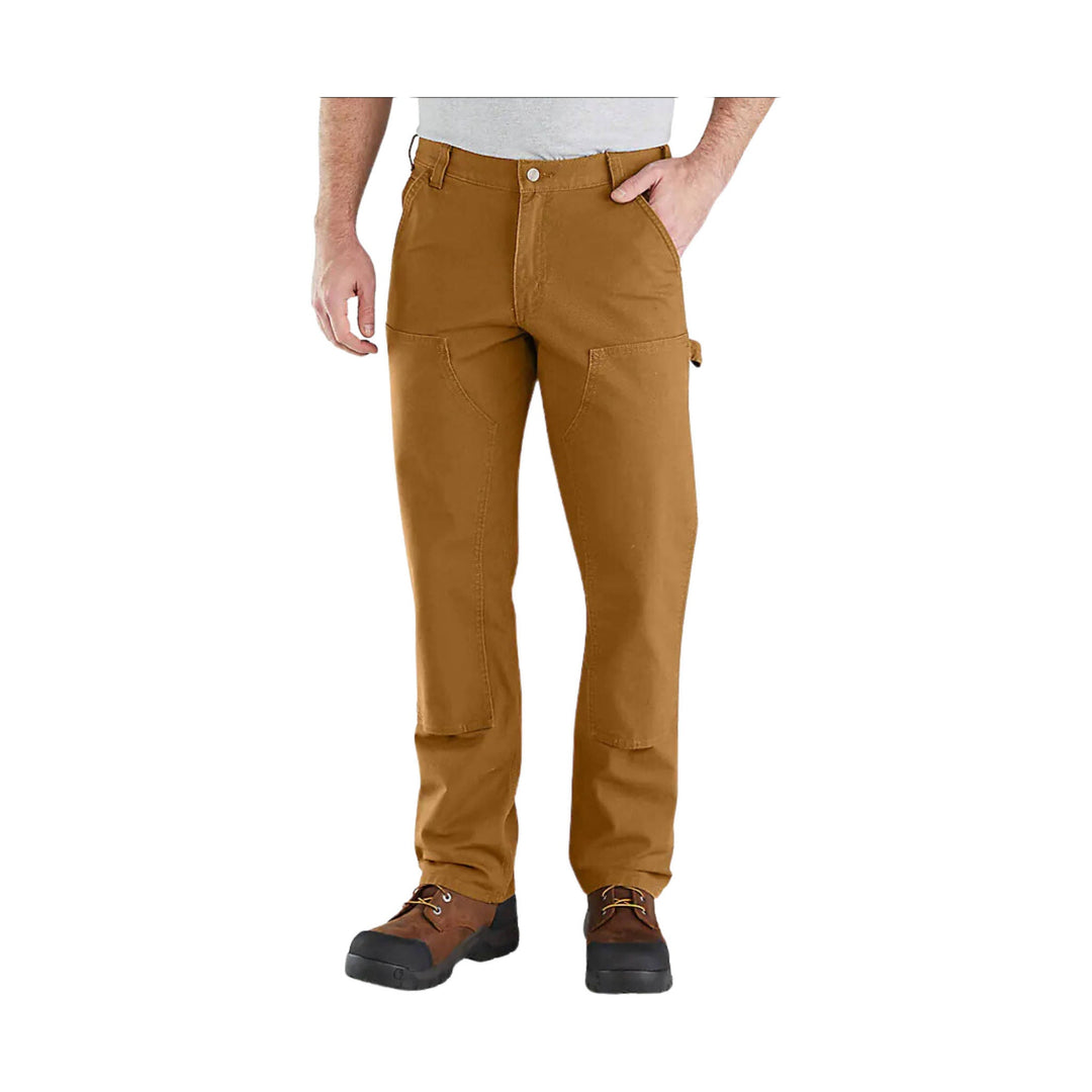 Brown work pants with reinforced knees and cargo-style side pockets, shown with brown work boots