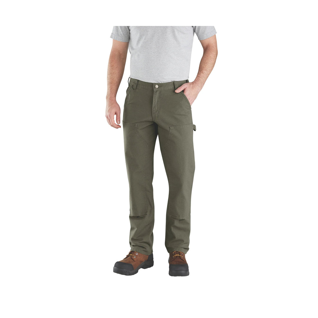 Olive-green work pants with reinforced knee panels and brown work boots