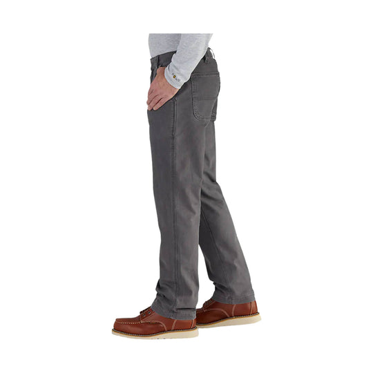 Gray relaxed-fit work pants in side view with brown lace-up shoes.