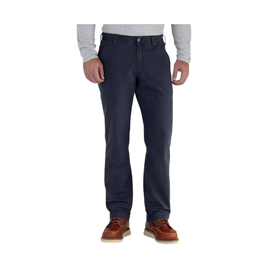 Navy straight-leg pants on a male model with brown shoes