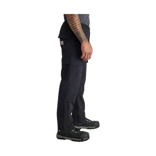 Black relaxed-fit cargo work pants shown in side view with utility pockets and reinforced knee panels