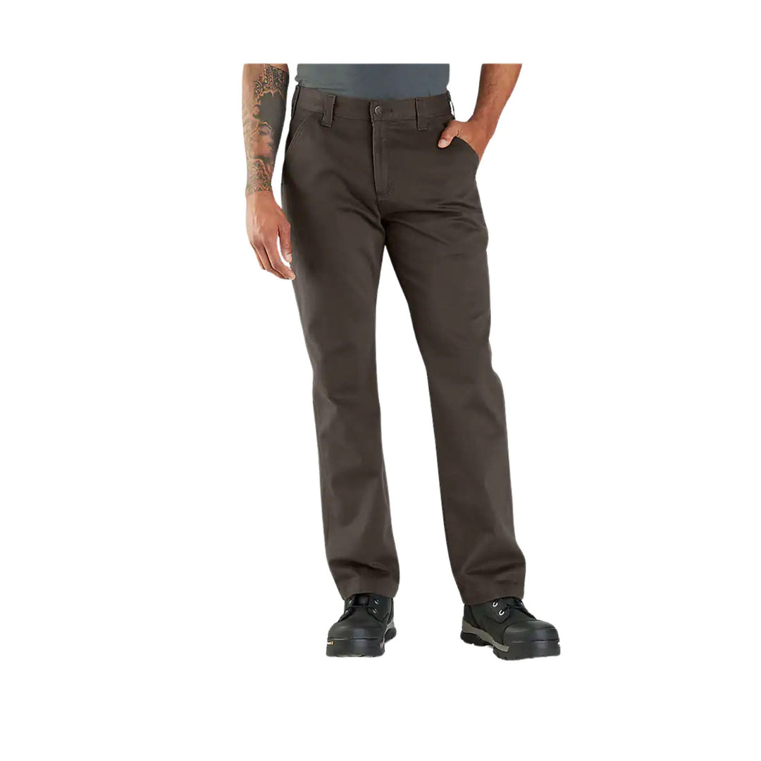 Brown pants worn by a person on a white background