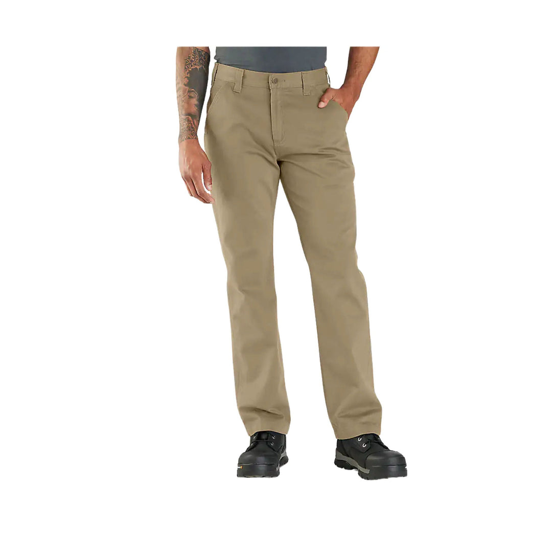 Tan relaxed-fit work pants on a model, shown from waist to shoes