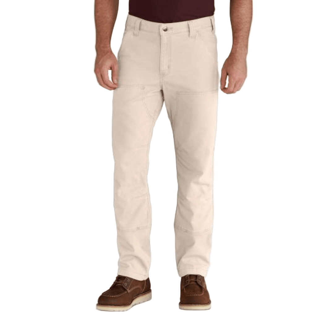 Beige relaxed-fit work pants on a model, shown full length with brown boots