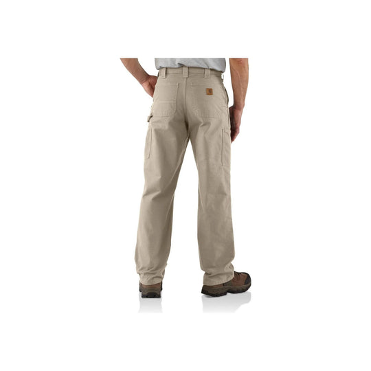 Beige work pants worn by a person on a white background
