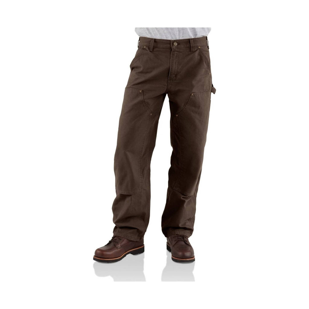 Brown pants worn by a person on a white background
