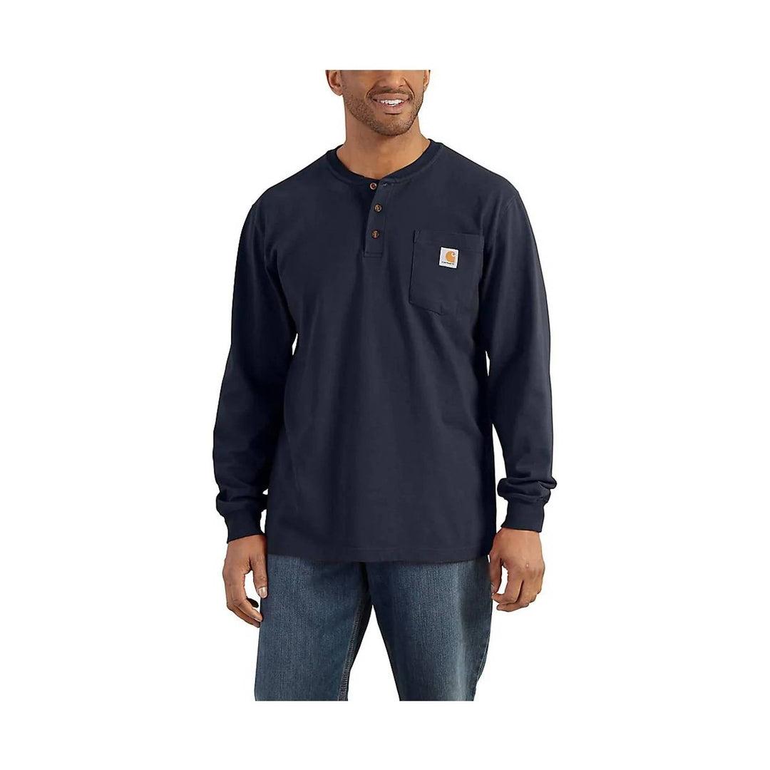 Man wearing a navy long-sleeve shirt with a brand logo on a white background