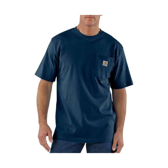 Person wearing a navy blue t-shirt with a pocket on a white background