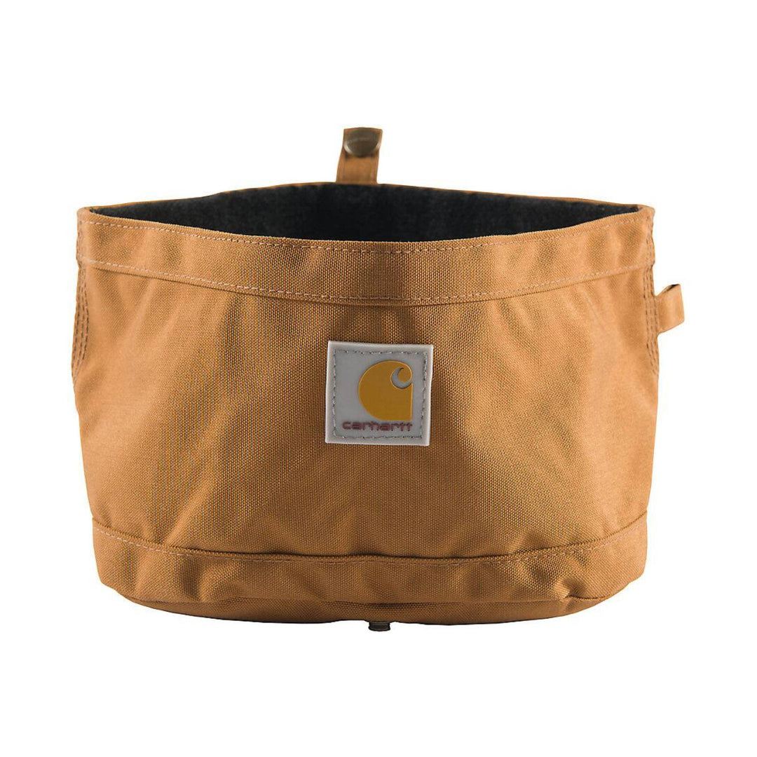 Brown collapsible fabric dog bowl with black interior and front logo patch