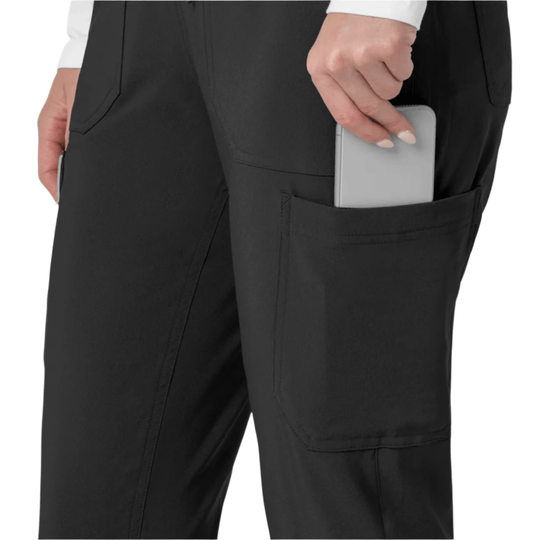 Black cargo scrub pants with large thigh pockets and a phone in the right pocket