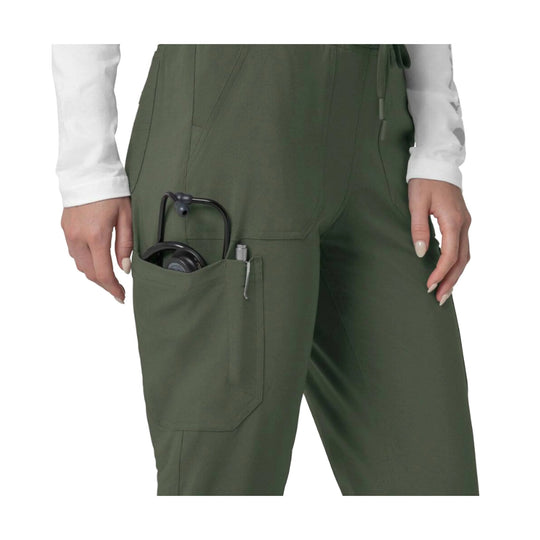 Olive scrub jogger pants with a cargo pocket holding a black stethoscope
