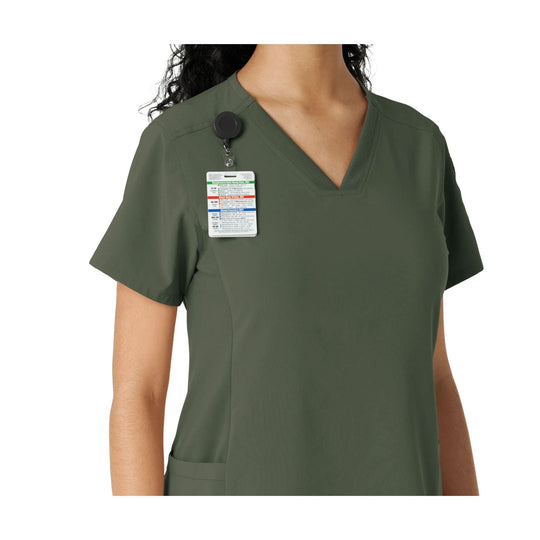 Olive scrub top with V-neck, short sleeves, and a clipped medical reference card on the chest