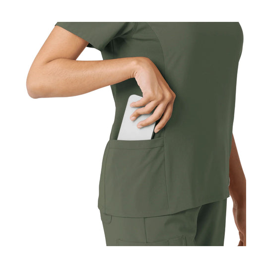 Olive scrub top with a side cargo pocket holding a phone, shown in side view