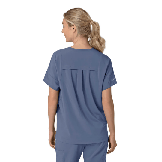 Back view of a blue V-neck scrub top with short sleeves and a pleated yoke
