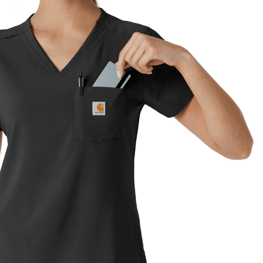 Black V-neck scrub top with chest pocket, pen slot, and card tucked in pocket