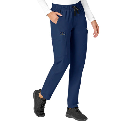 Navy straight-leg scrub pants with elastic waistband, cargo pockets, and black sneakers