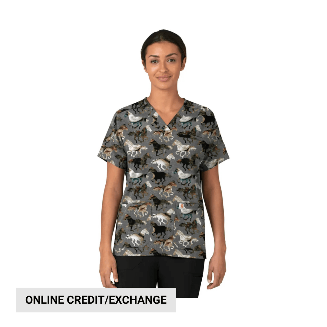 Gray V-neck scrub top with allover horse print and black pants on model, with "ONLINE CREDIT/EXCHANGE" text