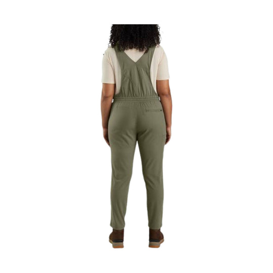 Olive bib overalls shown from the back with adjustable straps and a cropped ankle length