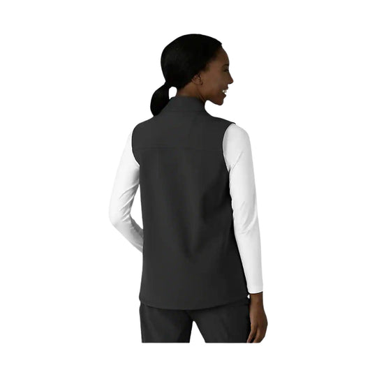 Black sleeveless vest shown from the back over a white long-sleeve top.